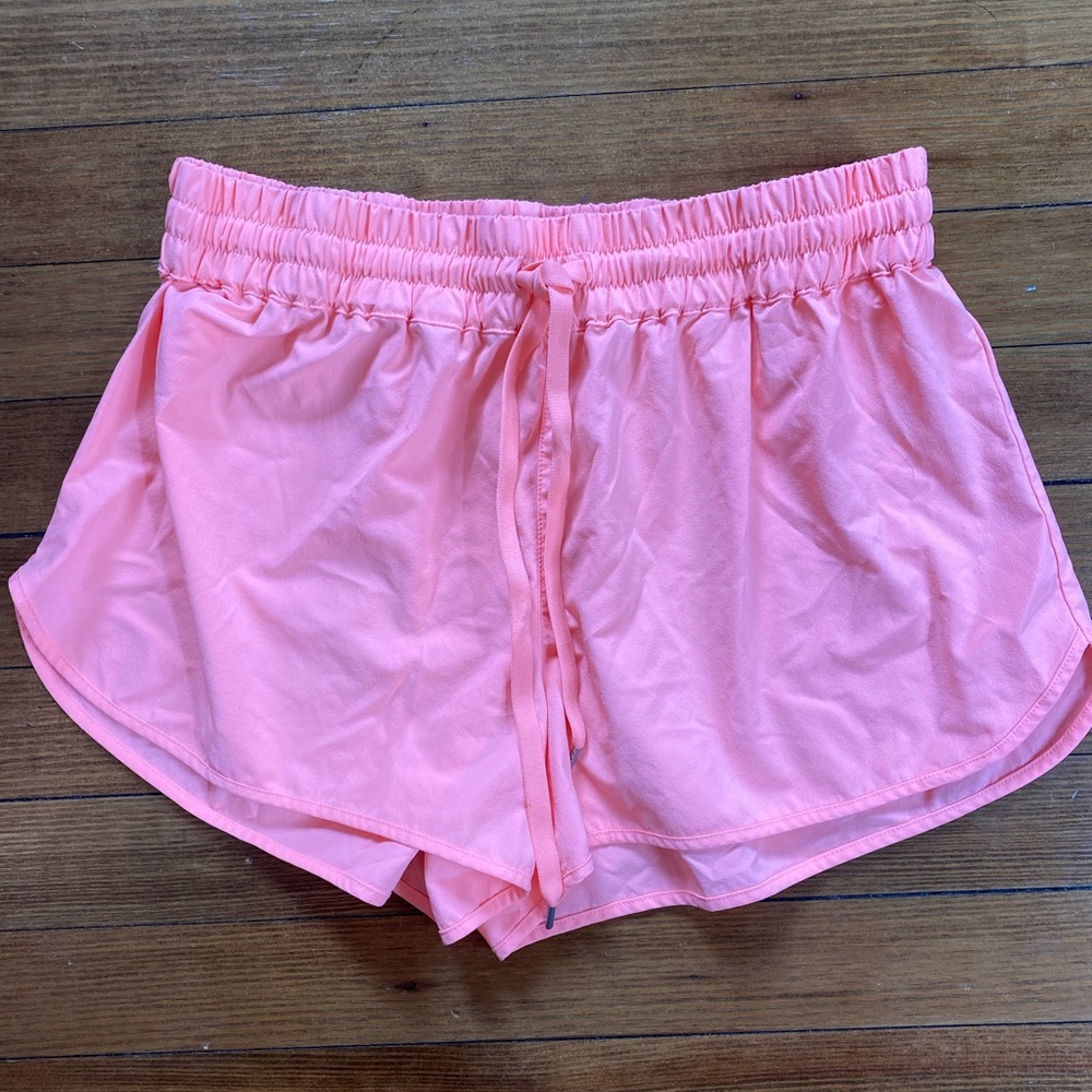 Neon coral aritzia athletic shorts